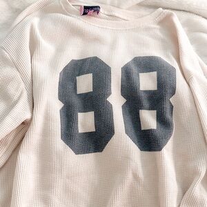 Edikted Cream Sweater with Black Number Design